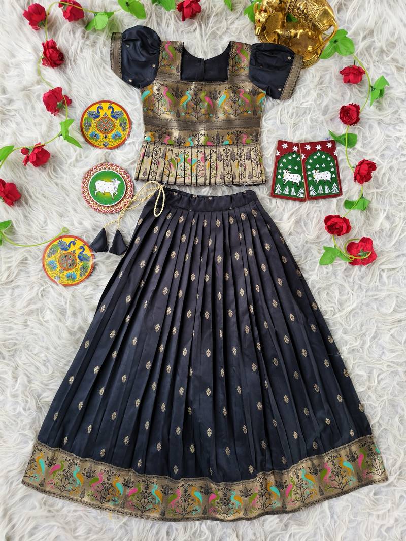 Black ethnic skirt and top set featuring an elegant border design with intricate woven motifs