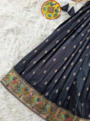 Black ethnic skirt and top set featuring an elegant border design with intricate woven motifs 4