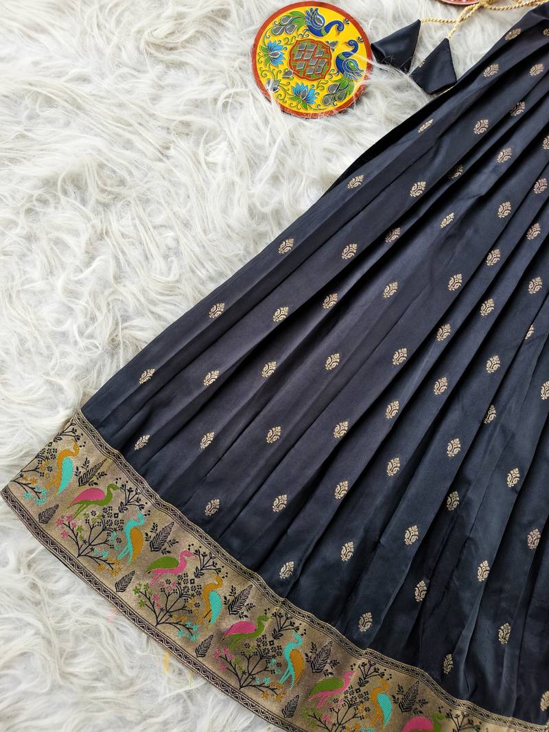 Black ethnic skirt and top set featuring an elegant border design with intricate woven motifs