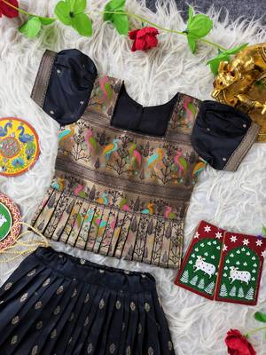 Black ethnic skirt and top set featuring an elegant border design with intricate woven motifs 5