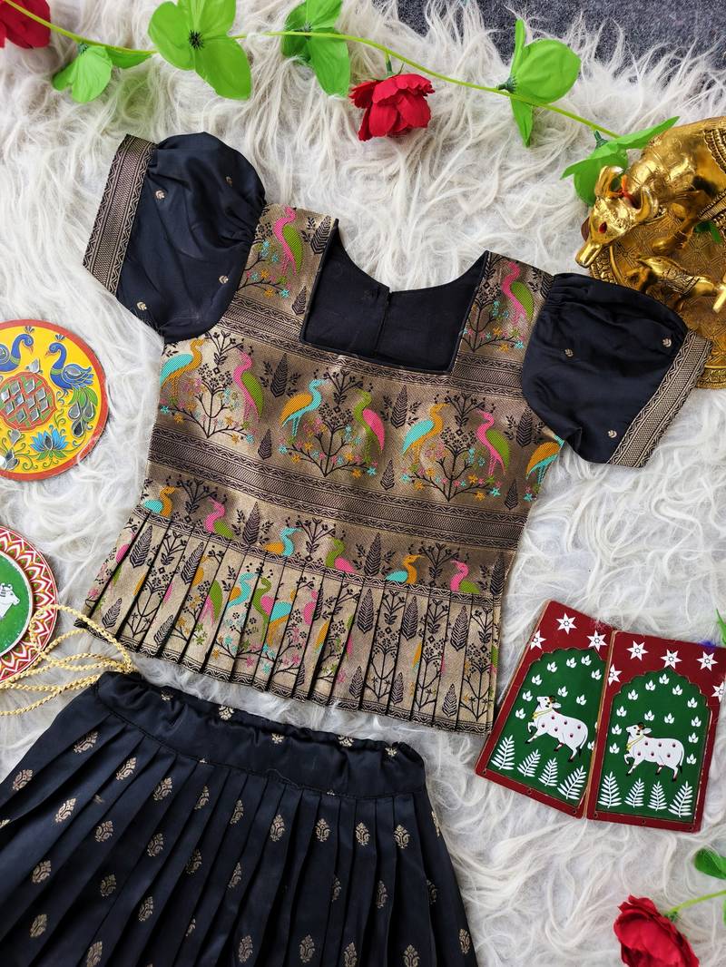 Black ethnic skirt and top set featuring an elegant border design with intricate woven motifs