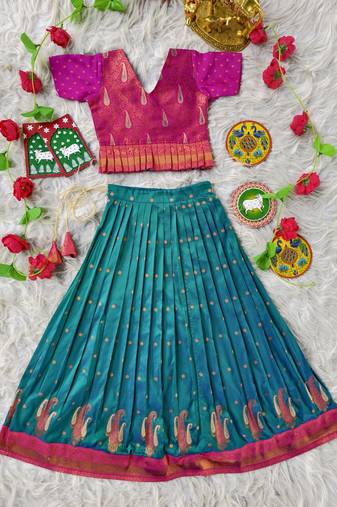 Beautiful ethnic skirt and top set featuring an elegant daaman design with intricate woven motifs