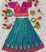 Beautiful ethnic skirt and top set featuring an elegant daaman design with intricate woven motifs