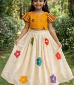 cottan multi-floral print top paired with a matching floral skirt