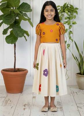 cottan multi-floral print top paired with a matching floral skirt 2