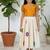 cottan multi-floral print top paired with a matching floral skirt