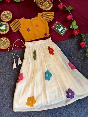cottan multi-floral print top paired with a matching floral skirt 5