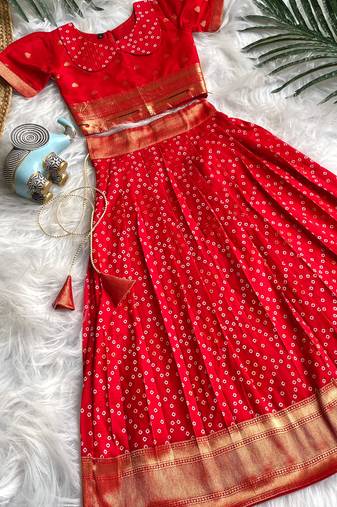 Girls red bandhani skirt and top set with radha krishna motif back design