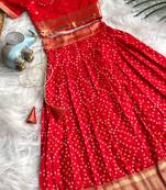 Girls red bandhani skirt and top set with radha krishna motif back design