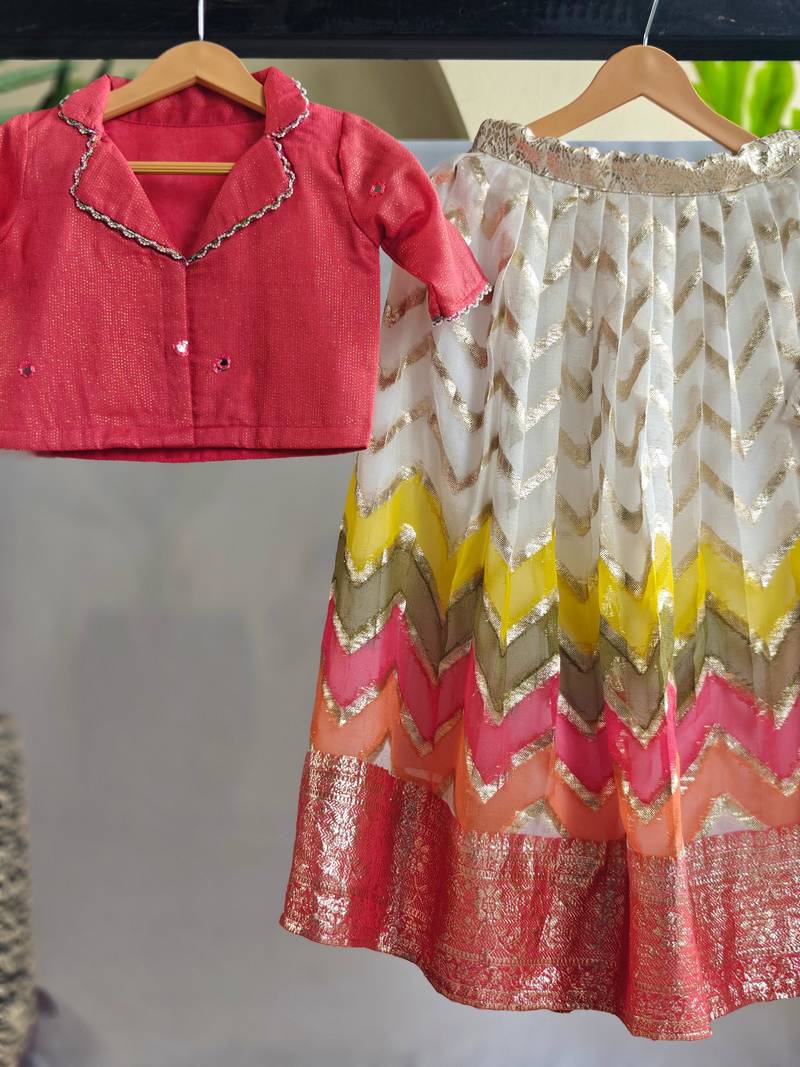 Girls pink silk blend woven lehenga choli with ruffle sleeves & shawl collar