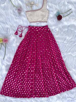 Pink one-shoulder solid crop top with polka dot flared lehenga for girls 1