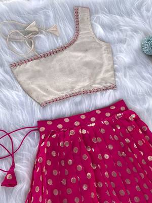 Pink one-shoulder solid crop top with polka dot flared lehenga for girls 2