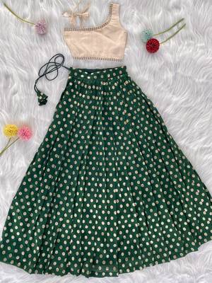 Green one-shoulder solid crop top with polka dot flared lehenga for girls 1