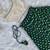 Green one-shoulder solid crop top with polka dot flared lehenga for girls