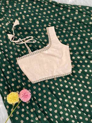 Green one-shoulder solid crop top with polka dot flared lehenga for girls 3
