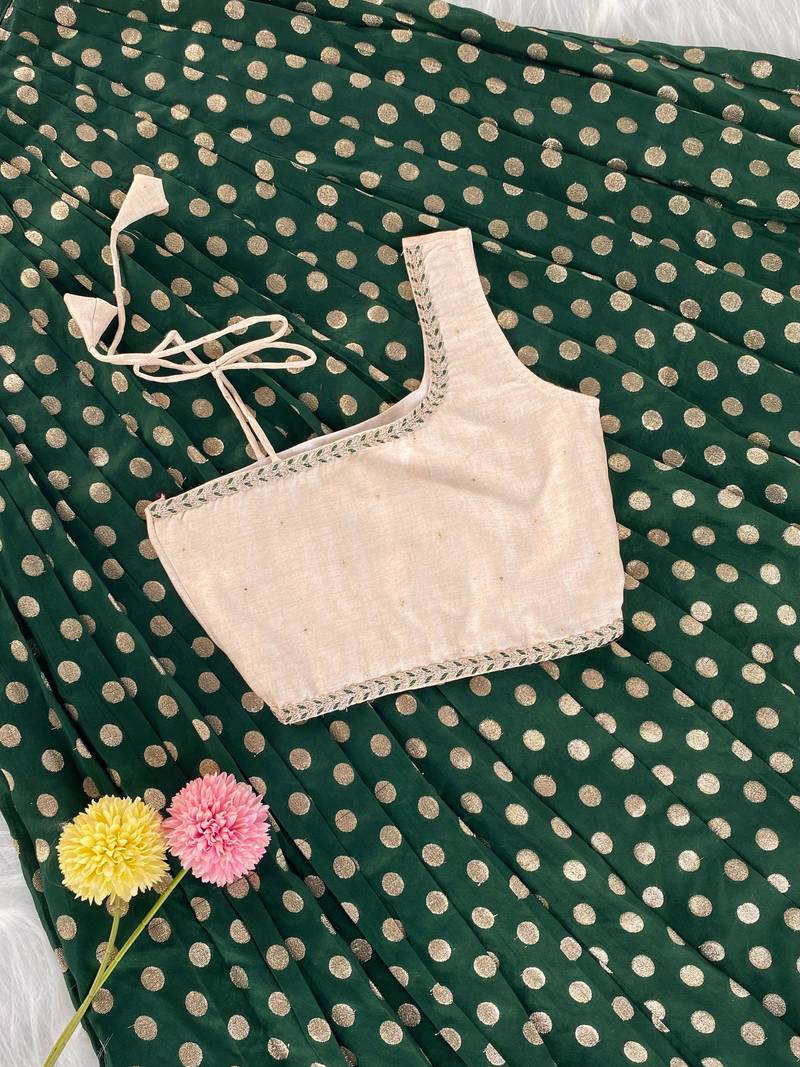 Green one-shoulder solid crop top with polka dot flared lehenga for girls