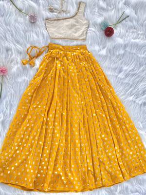 Yellow one-shoulder solid crop top with polka dot flared lehenga for girls 1