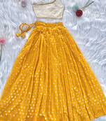 Yellow one-shoulder solid crop top with polka dot flared lehenga for girls