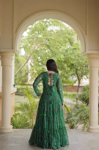 Green faux georgette bandhni print with kutchi patche work ruffle navratri gown
