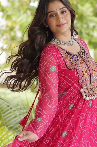 Pink faux georgette bandhni print with kutchi patche work ruffle navratri gown