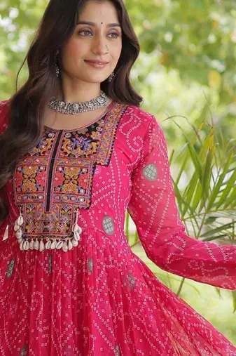 Pink faux georgette bandhni print with kutchi patche work ruffle navratri gown