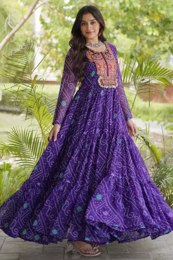 Purple faux georgette bandhni print with kutchi patche work ruffle navratri gown