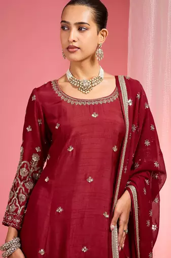 Reddish maroon hand embroidered viscose dupion silk kurta sharara set