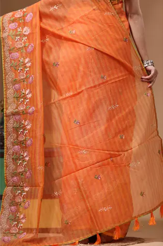 Orange supernet with computer embroidery saree with blouse piece