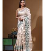 Off-white banarasi silk (jacquard) with computer embroidery saree with blouse piece
