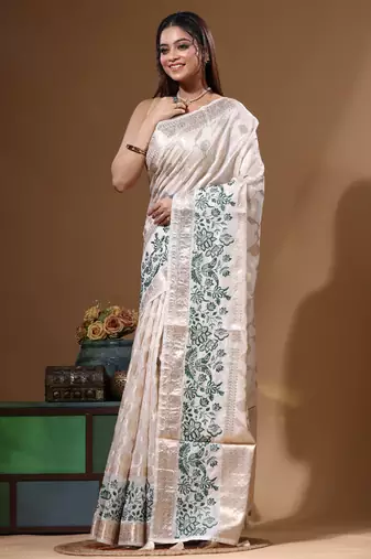 Off-white banarasi silk (jacquard) with computer embroidery saree with blouse piece