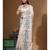 Off-white banarasi silk (jacquard) with computer embroidery saree with blouse piece