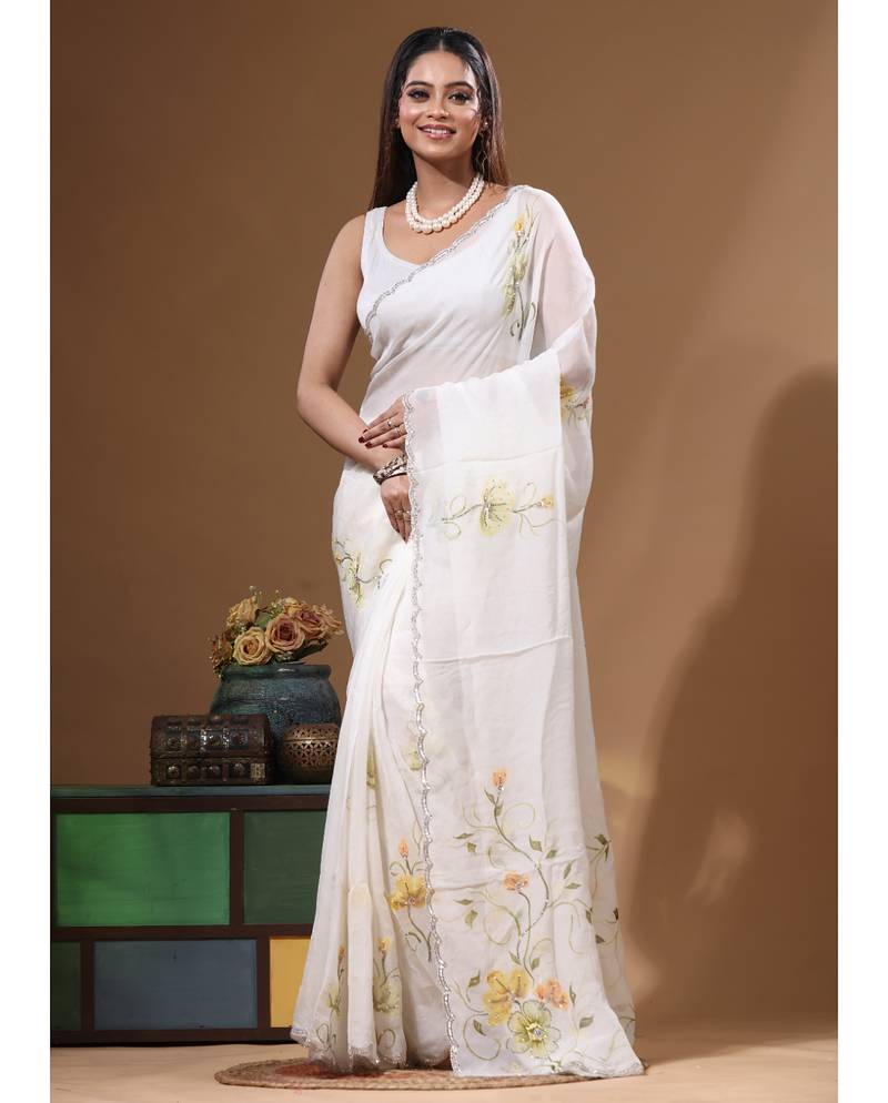 Off-white viscose organza with hand work saree with blouse piece