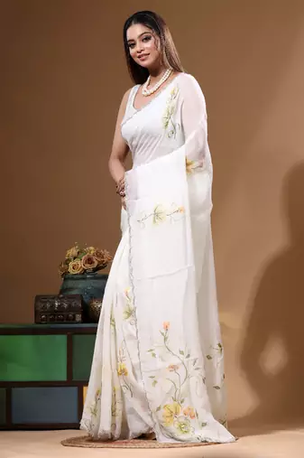 Off-white viscose organza with hand work saree with blouse piece