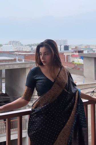 banarasi silk blend black color woven saree with blouse