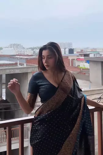 banarasi silk blend black color woven saree with blouse