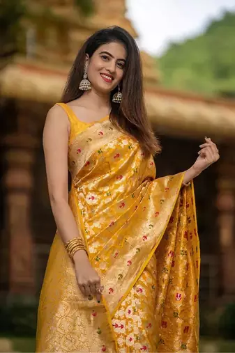 banarasi silk blend yellow color woven saree with blouse
