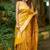banarasi silk blend yellow color woven saree with blouse