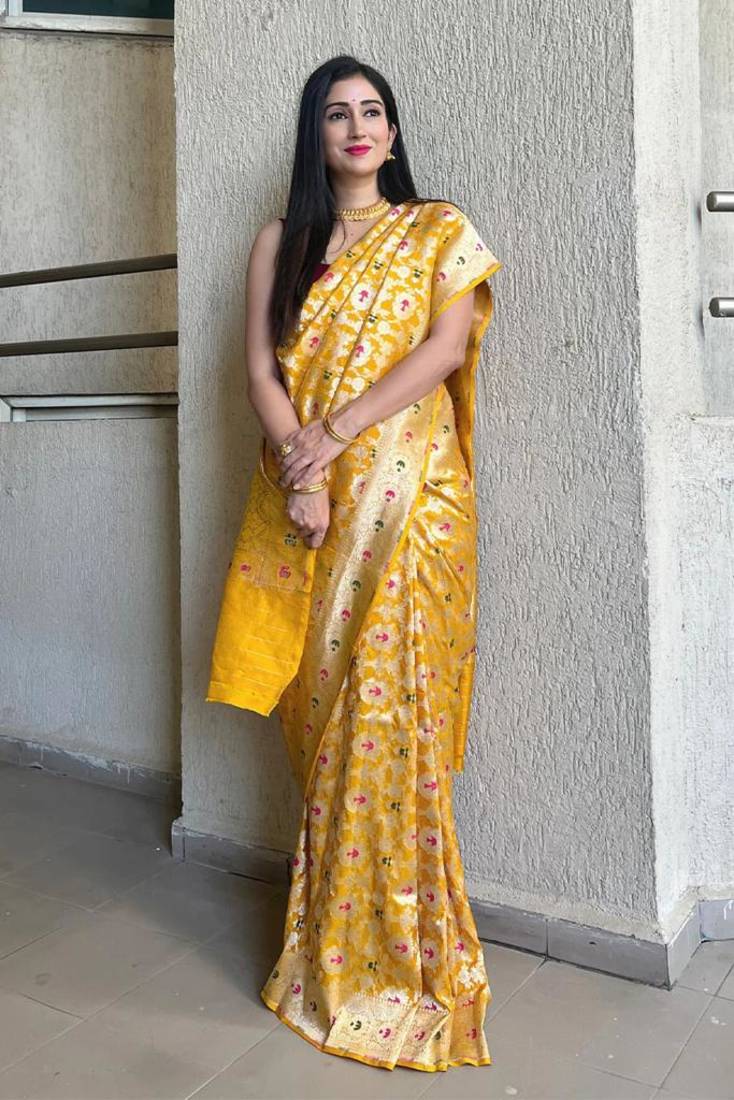 banarasi silk blend yellow color woven saree with blouse
