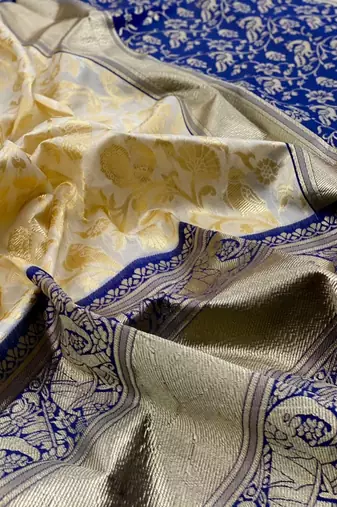 Blue white silk blend banarasi saree with unstitched blouse piece