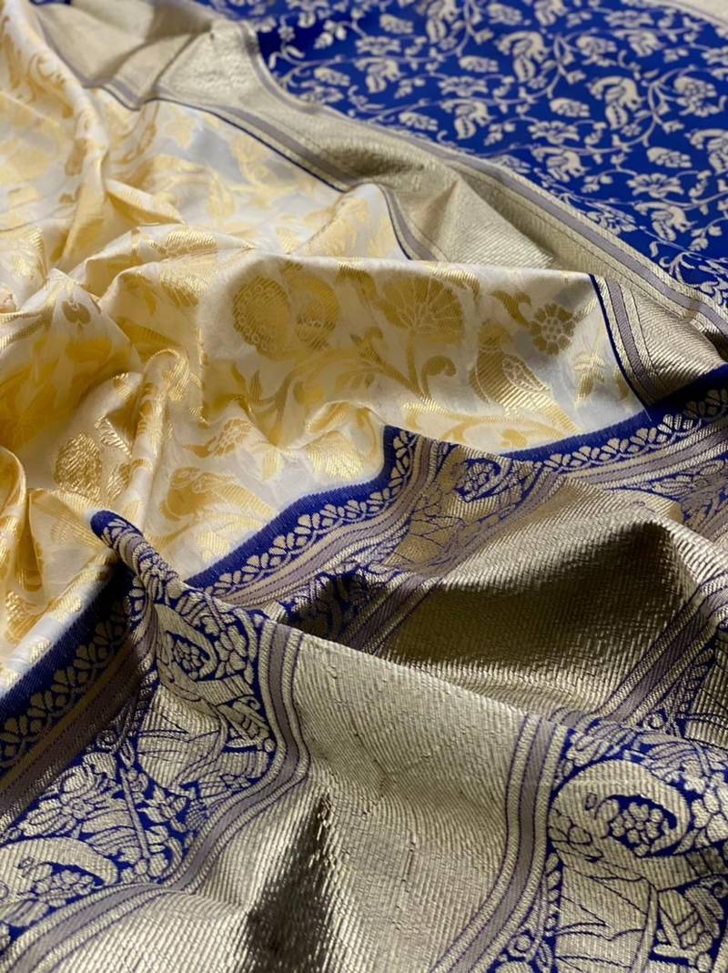 Blue white silk blend banarasi saree with unstitched blouse piece