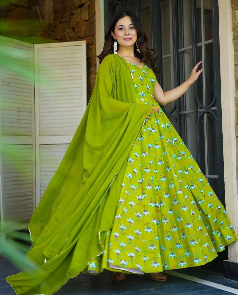 Green rayon floral printed fully flared anarkali gown for women