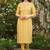 Yellow cotton blend geometric printed kurta for women
