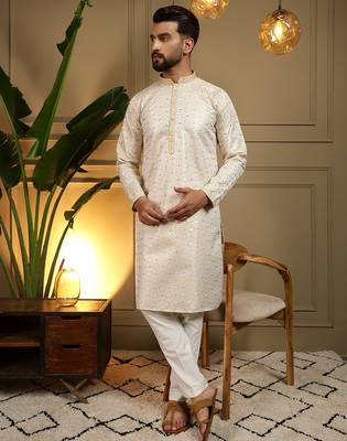 Yellow heavy jecquard print party wear kurta and payjama 1