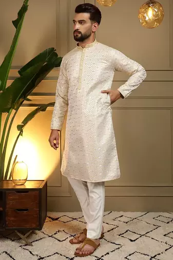 Yellow heavy jecquard print party wear kurta and payjama