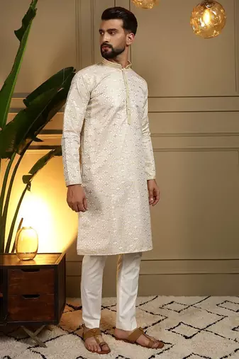 Yellow heavy jecquard print party wear kurta and payjama