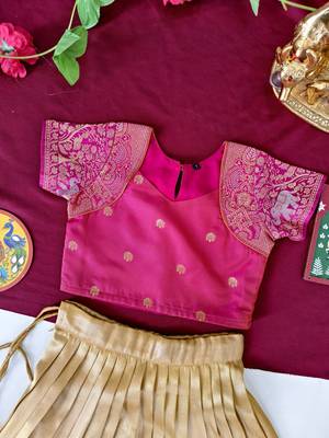 Gold silk tissue skirt paired with a soft silk top, adorned with a contrast pink border 5