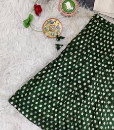 Girls traditional green polka dot lehenga choli in silk blend with v-neck