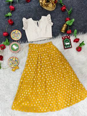 Girls traditional yellow polka dot lehenga choli in silk blend with v-neck 1