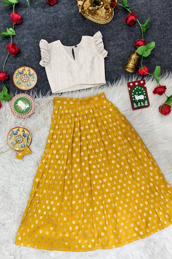 Girls traditional yellow polka dot lehenga choli in silk blend with v-neck