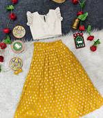 Girls traditional yellow polka dot lehenga choli in silk blend with v-neck